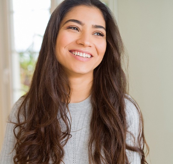 Closeup of woman smiling at home