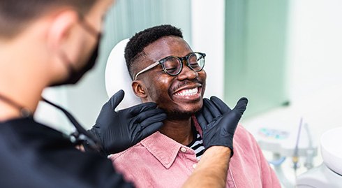 Man smiling at the dentist