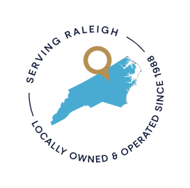 Badge of North Carolina with circular text that reads Serving Raleigh Locally Owned and Operated Since 1988